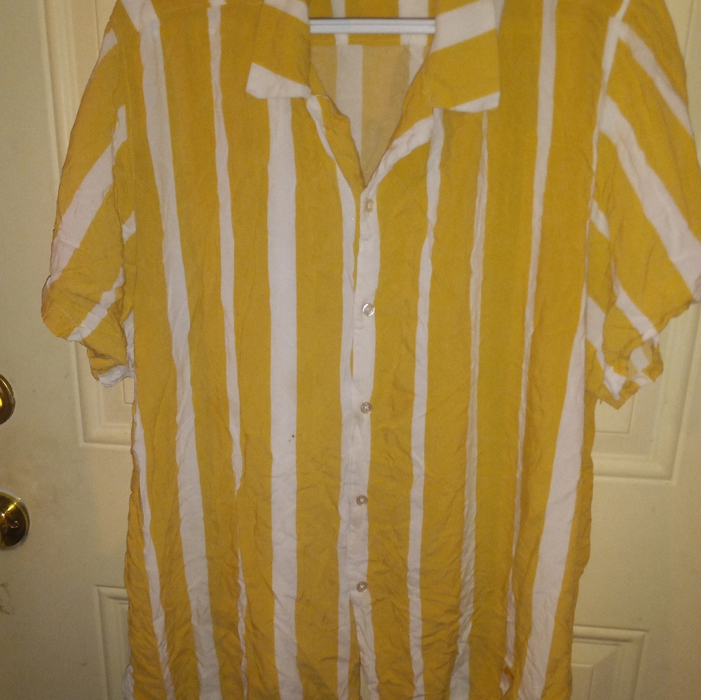 Men's button up, striped white and yellow shirt.